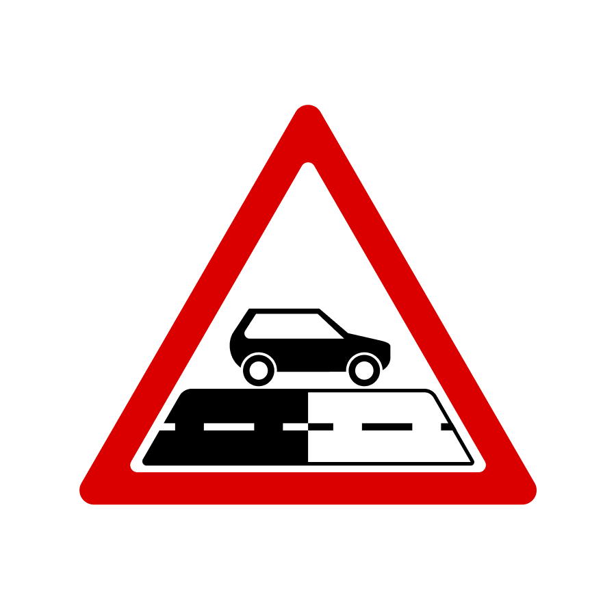 Український дорожній знак 1.40 Зміна покриття